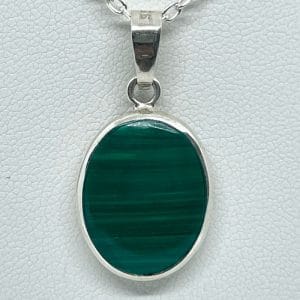 Colgante reversible ovalado 2,8 x 1,4 cms en lapislázuli y malaquita
